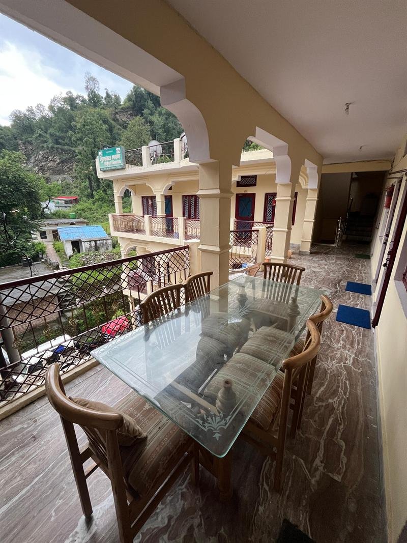 Veranda seating with views of the hills