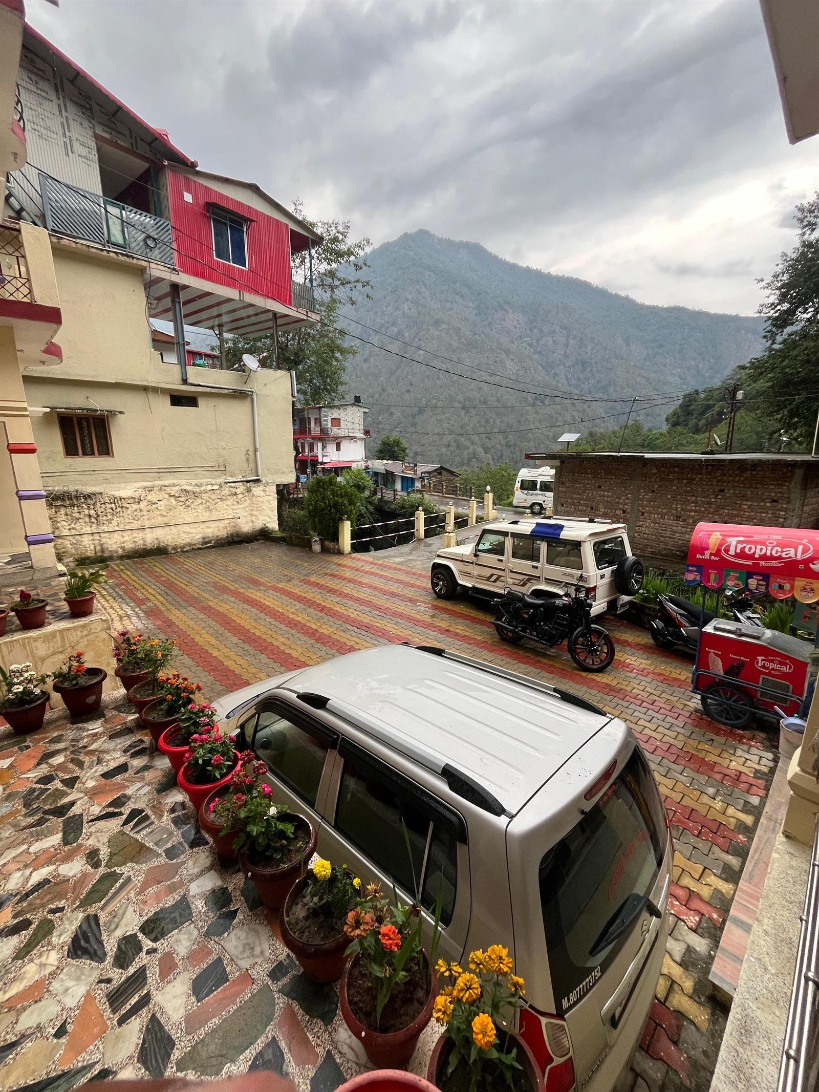 Courtyard of Gujrat Bhawan with the Garhwal hills behind