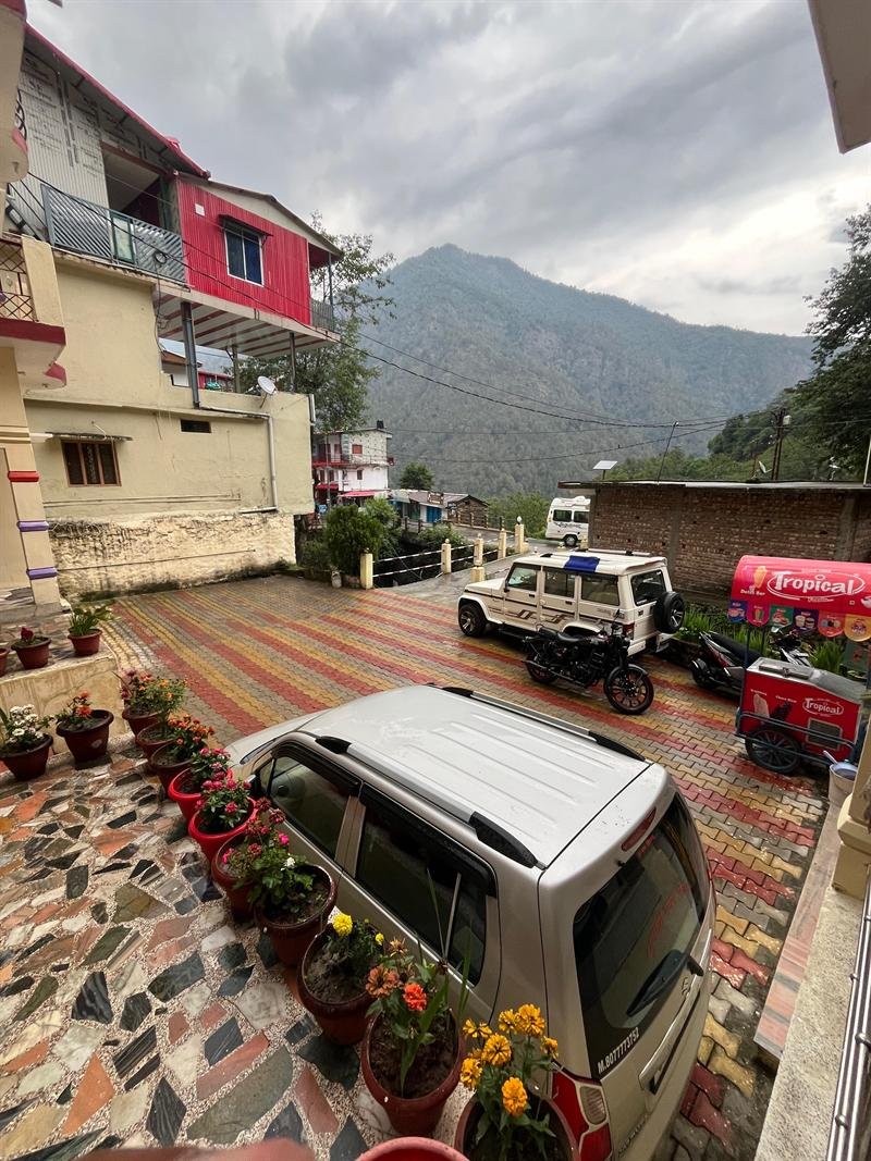 Courtyard of Gujrat Bhawan with the Garhwal hills